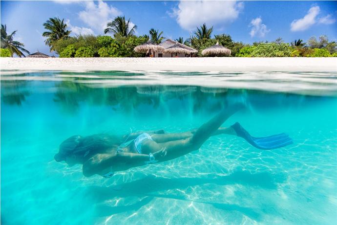 Palm Beach Resort and Spa Maldives, Madhirivaadhoo - Compare Deals