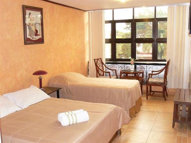 Plaza Maria Luisa Suites Inn